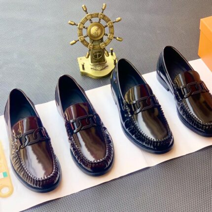 Tod’s Polished Black Leather Loafers