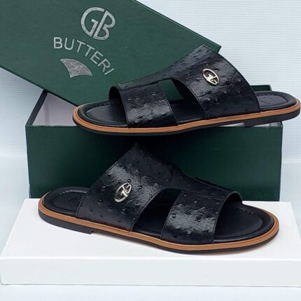 GB Butteri Black Ostrich-Textured Slide Sandals with Silver Crest